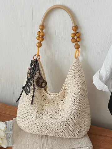 Damen Aushöhlen Gehäkelt Strohgeflecht Tragetasche Große Kapazität Strand Urlaub Schultertasche Mit Holzperlengriff Und Anhänger