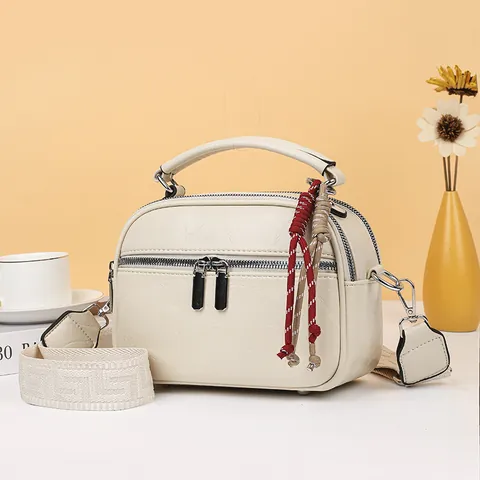 Mode PU Leder Kleine Runde Tasche Damen Minimalistische Umhängetasche Mit Breitem Geometrischem Gurt Und Doppelreißverschluss Quaste