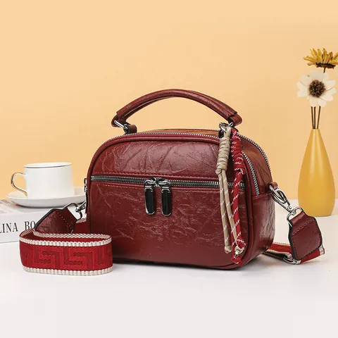 Mode PU Leder Kleine Runde Tasche Damen Minimalistische Umhängetasche Mit Breitem Geometrischem Gurt Und Doppelreißverschluss Quaste