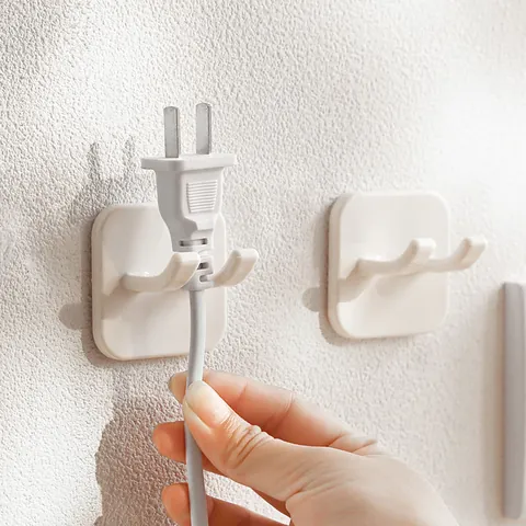 Gancho para Enchufe Sin Perforación Organizador de Cable de Alimentación Autoadhesivo Soporte de Almacenamiento de Cables de Pared para Electrodomésticos Diseño Minimalista Blanco