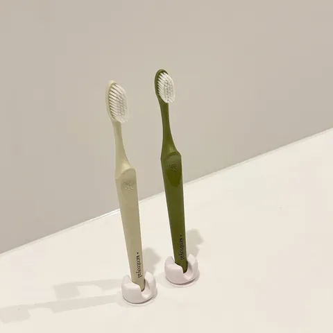 Porte-Brosse à Dents à Ventouse Mural Minimaliste Sans Perçage Support de Brosse à Dents Électrique Crochet de Rangement de Salle de Bain Blanc