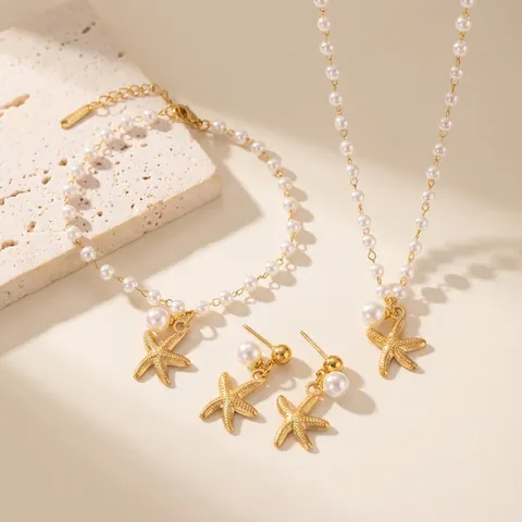 Set di Gioielli con Perle Sintetiche e Stella Marina Stile Oceano in Acciaio al Titanio Collana Bracciale Orecchini Donna