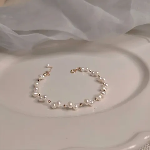 Bracelet en Perles d'Eau Douce Tissé à la Main Design de Niche Perles Naturelles Baroques Bracelet en Cuivre Plaqué Or Femme