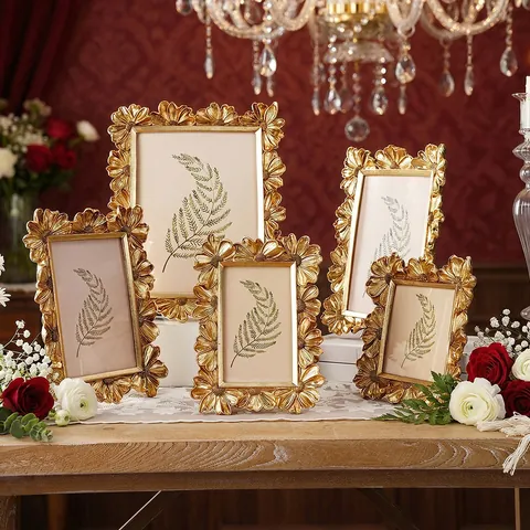 Französischer Vintage Gold Harz Bilderrahmen Gänseblümchen Relief Klassischer Tisch-Fotorahmen Luxus Wohnzimmer Deko