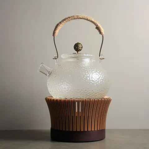 Modern Minimalist Heat Resistant Hammered Borosilicate Glass Teapot With Hollow Out Aluminum Tea Warmer Base For Constant Temperature Heating Home Tea Set