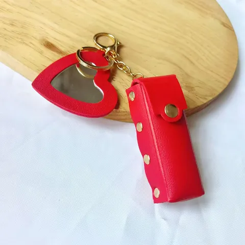 Étui à Rouge à Lèvres Portable en Cuir Artificiel Avec Porte-Clés Miroir Cœur Texture Litchi Accessoire de Sac Mode Femme