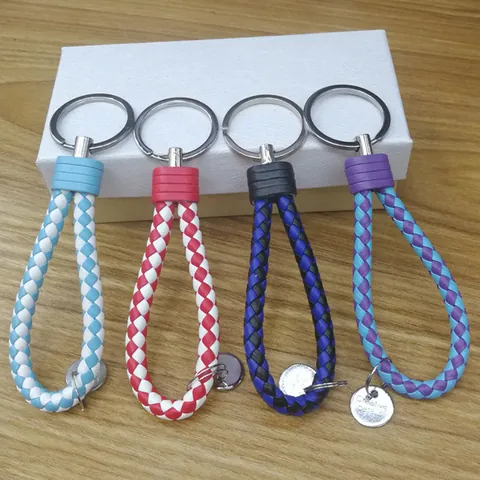 Porte-clés en Cuir Tressé Cordon PU Avec Pendentif en Métal Pendentif de Sac Coloré Tissé à la Main Accessoire de Voiture Cadeau