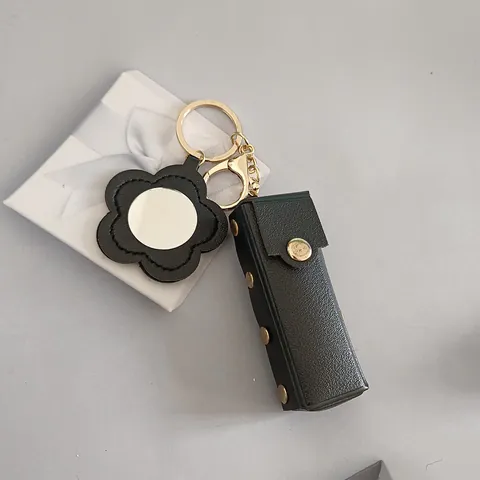 Pochette de Rouge à Lèvres Portable en Cuir Avec Porte-clés Miroir Fleur Mini Sac de Maquillage Pendentif de Sac Cadeau Femme