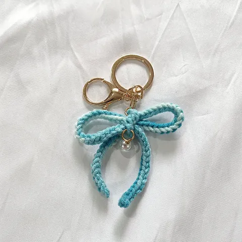 Porte-clés Nœud en Fil Fait Main pour Femmes Bijou de Sac Mignon Avec Décoration de Perle Artificielle Alliage