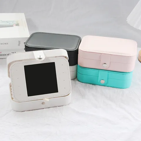 Portable PU Leather Jewelry Storage Box With Built-in Mirror Flip Top Elegant Jewelry Organizer For Rings Earrings Necklaces Travel Carrying Case