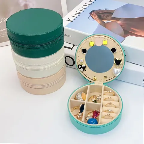Tragbare Runde PU Leder Schmuckkästchen Mit Spiegel Kleine Reise Schmuckschatulle Für Ohrringe Ringe Armbänder Minimalistischer Organizer
