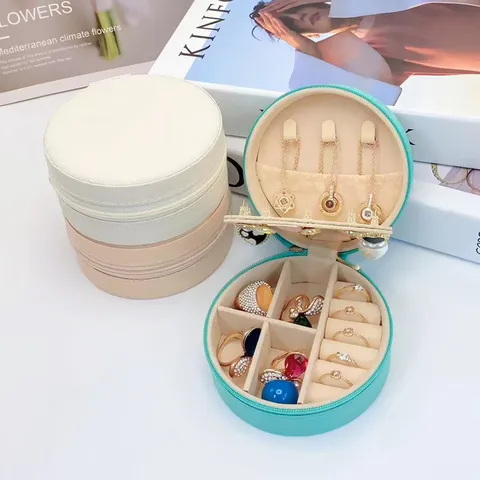 Tragbare Runde PU Leder Schmuckkästchen Mit Spiegel Kleine Reise Schmuckschatulle Für Ohrringe Ringe Armbänder Minimalistischer Organizer