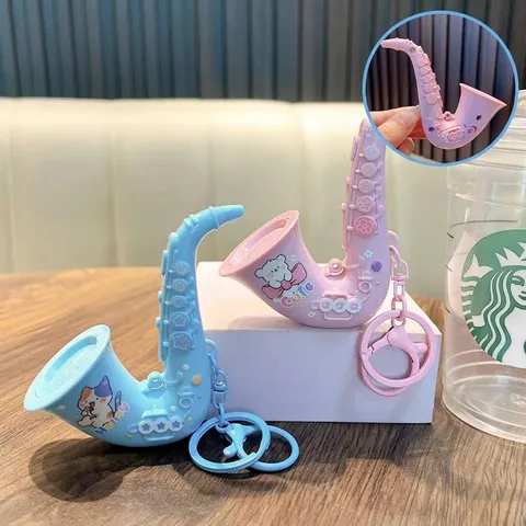 Llavero de Saxofón de Juguete Musical de Plástico ABS Mini Colgante de Instrumento Dibujos Animados Alivio del Estrés