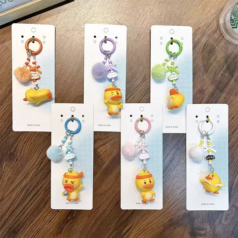 Süße Cartoon Ente Bommel Perlen Handy Anhänger Schlüsselanhänger Für Damen Mädchen Kawaii Tasche Anhänger Dekoration Legierung Schlüsselring Geschenk