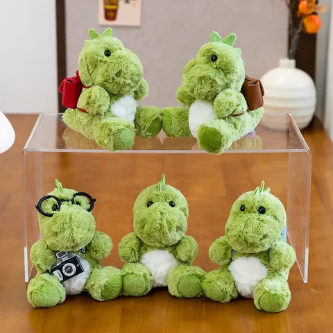 Simpatico Dinosauro di Peluche Verde Seduto Mascotte Drago Animale di Peluche Con Mini Zaino Occhiali Macchina Fotografica Regalo