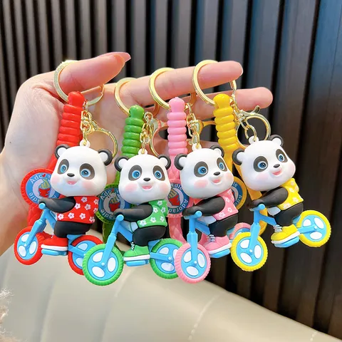 Cartoon Panda Riding Bicycle Keychain PVC Soft Glue 3D Animal Figure Bag Charm Woven Strap Pendant For Women Kids Gift