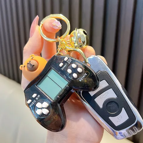 Mini Console di Gioco Portatile Capybara Portachiavi Simpatico Controller per Cartoni Animati Antistress Puzzle Pendente con Campanello d'Oro