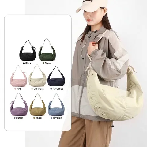 Women Large Capacity Pleated Moon Hobo Bag Nylon Waterproof Dumpling Crossbody Bag Minimalist Commuter Shoulder Bag With Hanging Ribbon