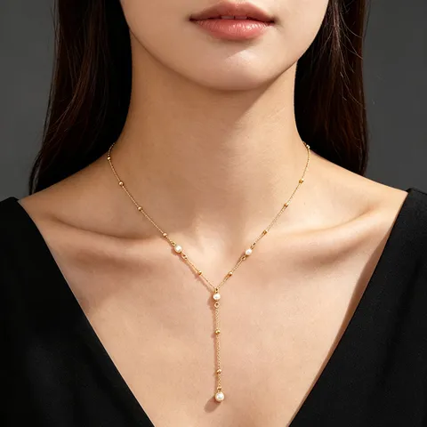Elegante Collana da Donna a Forma di Y con Nappa in Lega Placcata Oro Perla Artificiale Strass Croce Catena di Perline Collana della Clavicola
