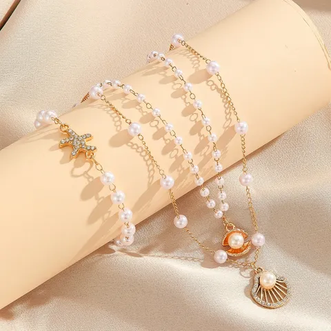 Set di Gioielli Stella Marina Conchiglia Perla Artificiale Collana Bracciale in Lega Strass per Donna Accessori Vacanze Estive Oceano