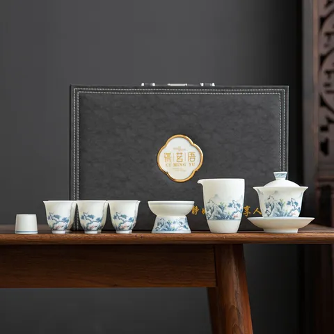 Luxury White Porcelain Kung Fu Tea Set Landscape Pattern Handmade Biscuit Fired Ceramic Tea Set With Gift Box For Home Office