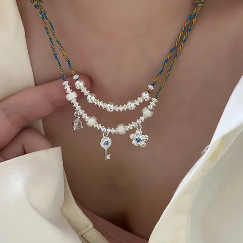 Collana a Strati Etnica Vintage da Donna in Rame Zirconia Chiave Fiore Ciondolo Corda Intrecciata Catena Clavicola con Perline