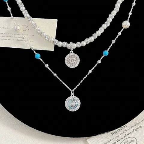 Lussuosa Collana di Perle Artificiali Bussola Stella Blu Zirconia per Donna Girocollo in Rame con Ciondolo in Zirconia Pave Gioielli di Moda