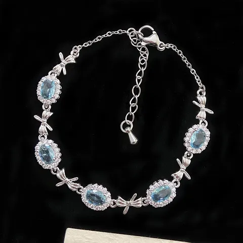 Squisito Bracciale in Zirconia Blu Cielo Rame Placcato Argento Lusso Leggero Regolabile Trifoglio Fiocco Cuore Gioielli Donna Regalo