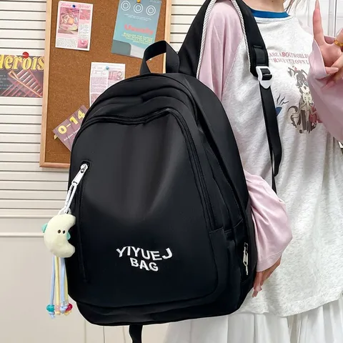 Sac à Dos Décontracté en Nylon Couleur Unie pour Étudiants Sac d'École Grande Capacité Sac de Voyage Unisexe Avec Pendentif