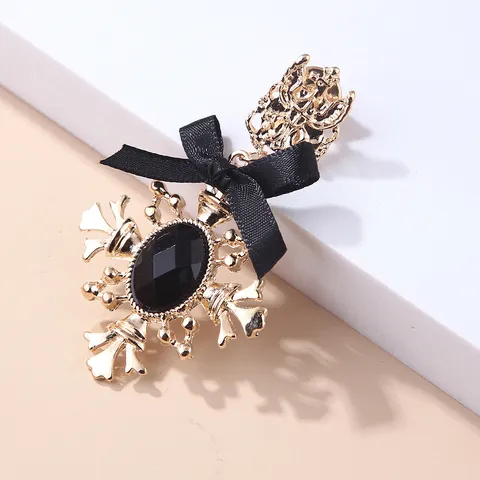 Vintage Gold Plated Cross Bow Brooch With Black Artificial Gemstone Elegant Fashion Jewelry Accessory For Women