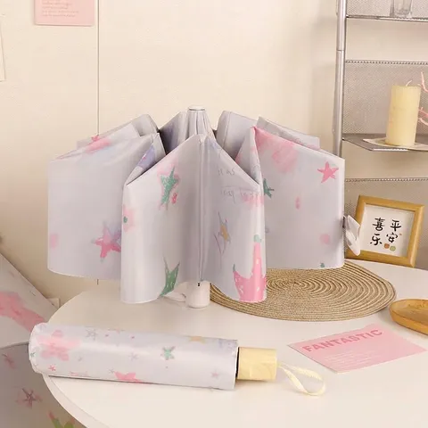 Ombrello Pieghevole a Tre Sezioni Con Stampa di Stelle Colorate e Rivestimento Nero Anti UV Ombrello Portatile Compatto