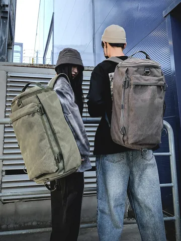 Fashion Large Capacity Canvas Travel Backpack Unisex Outdoor Sports Cylinder Rucksack Trendy Durable Schoolbag For Men And Women