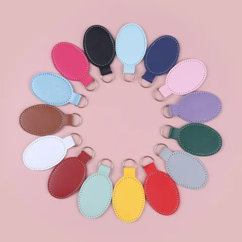 Ovale PU Leren Sleutelhanger Met Metalen Ring Effen Kleur Sleutelring Voor Autosleutels Tas Decoratie DIY Accessoires Mode