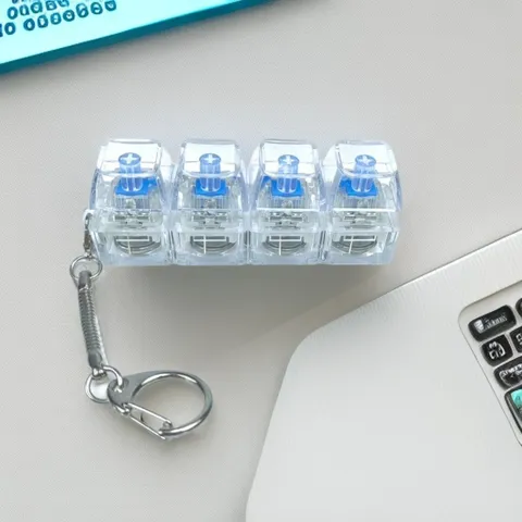 Llavero Juguete Antiestrés Teclado Mecánico 4 Teclas Lineal LED Luminoso Colgante Cristal Transparente
