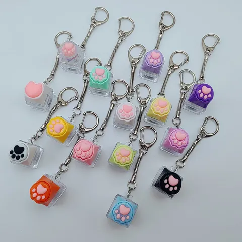 Llavero de Tecla Mecánica de Garra de Gato Lindo Alivio del Estrés LED Luminoso Colgante de Bolsa de Silicona Para Niñas