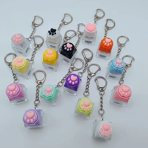 Llavero de Tecla Mecánica de Garra de Gato Lindo Alivio del Estrés LED Luminoso Colgante de Bolsa de Silicona Para Niñas