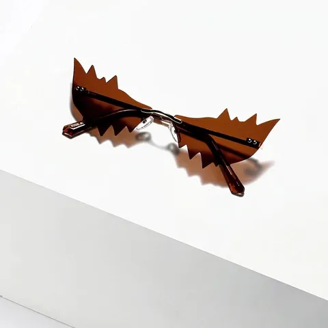 Y2K Rimless Jagged Cat Eye Sunglasses Men Women Metal Frame Bat Wing Shaped Lenses Party Fun Decorative Sun Glasses AC Lens