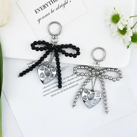 Simpatico Portachiavi a Cuore in Resina e Perla Artificiale Fiocco Lega Perline Pendente per Borsa Portachiavi Dolce Decorazione Donna