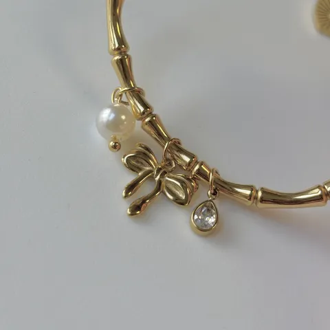 Damen Edelstahl 18K Vergoldet Armreif Armband Elegant Herz Delfin Schleife Künstliche Perle Zirkonia Anhänger Handkette