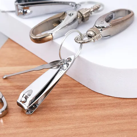 Juego de Herramientas de Llavero Portátil Multifuncional Cortauñas y Limpiador de Oídos Accesorio de Gadget de Bolsillo para Uso Diario