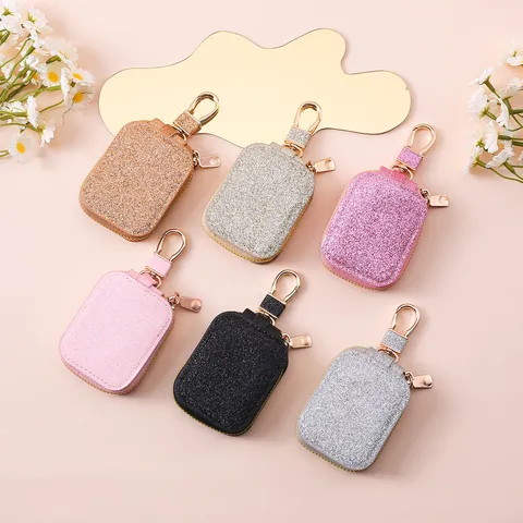 Custodia Protettiva per Auricolari Bluetooth con Paillettes per AirPods Borsa di Conservazione Portatile in Pelle PU con Chiusura Lampo e Gancio Metallico
