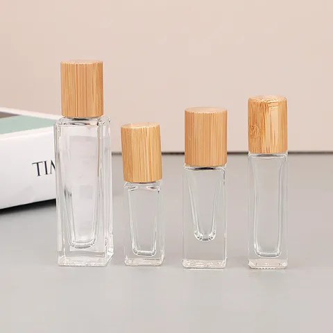 Draagbare Glazen Parfum Rollerfles Essentiële Olie Sub-verpakkingsfles Met Bamboe Deksel En Stalen Bal Reisdispenser