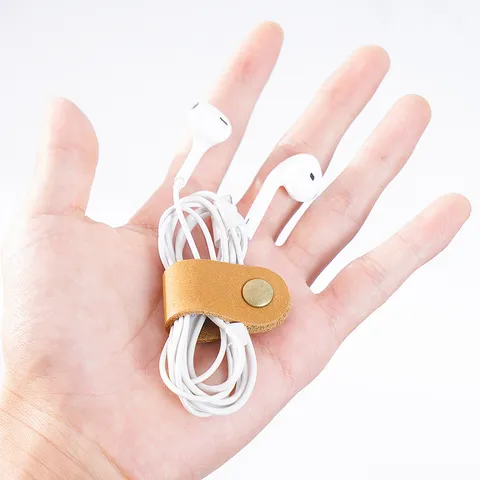 Organisateur de Câble en Véritable Cuir Minimaliste Enrouleur de Câble pour Écouteurs Boucle de Rangement Support Anti-Nœuds