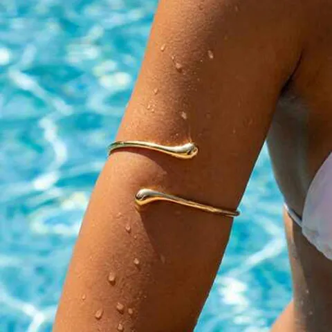 Bracciale Da Braccio In Metallo Dorato Minimalista Con Design Lava Per Donna Finitura Lucida Struttura Regolabile Gioiello Corpo