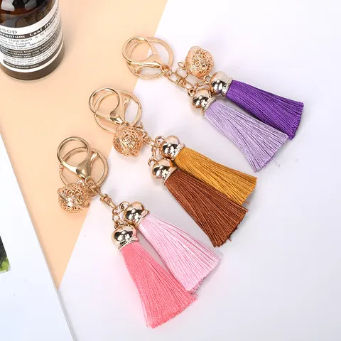 Zinklegering Holle Bel Kwastje Sleutelhanger Vrouwen Tas Hanger Auto Sleutelring Creatief Koppel Cadeau Dubbele Kwast Decor