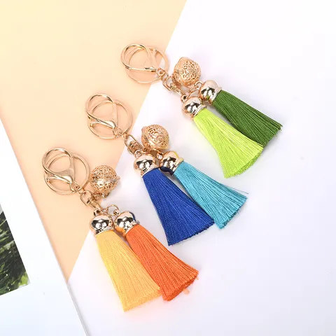 Zinklegering Holle Bel Kwastje Sleutelhanger Vrouwen Tas Hanger Auto Sleutelring Creatief Koppel Cadeau Dubbele Kwast Decor