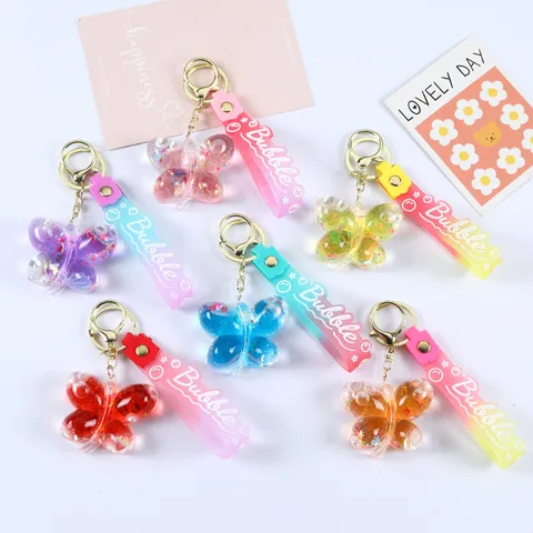 Acryl Flüssiger Sand Schmetterling Schlüsselanhänger Candy Farben Silikonband Tasche Anhänger Schmetterling Schlüsselring