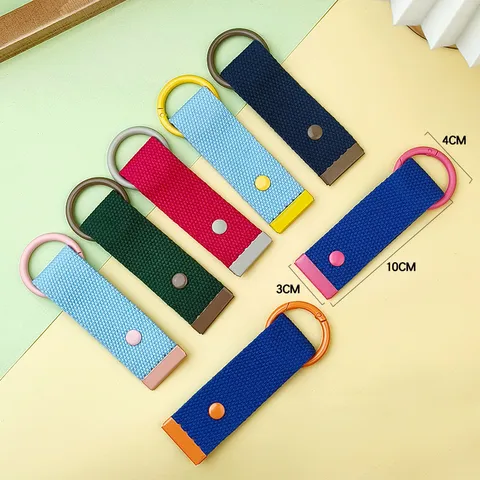 Portachiavi in Nastro Intrecciato Creativo DIY Ciondolo Tessuto Colorato per Valigia Borsa Zaino Ornamento Sospeso