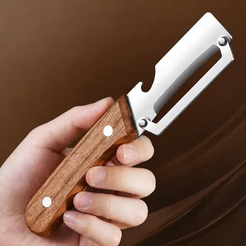 Multifunctional Stainless Steel Vegetable Peeler Wooden And Plastic Handle Fruit Peeler Kitchen Gadget Slicing Tool