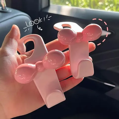 Gancho para Asiento de Coche con Lazo Dopamina Lindo Gancho de Resina Organizador de Almacenamiento Interior de Coche Accesorios de Coche para Mujeres